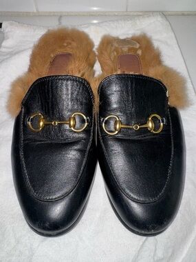 Gucci Princetown leather mules featuring signature gold-tone horsebit hardware